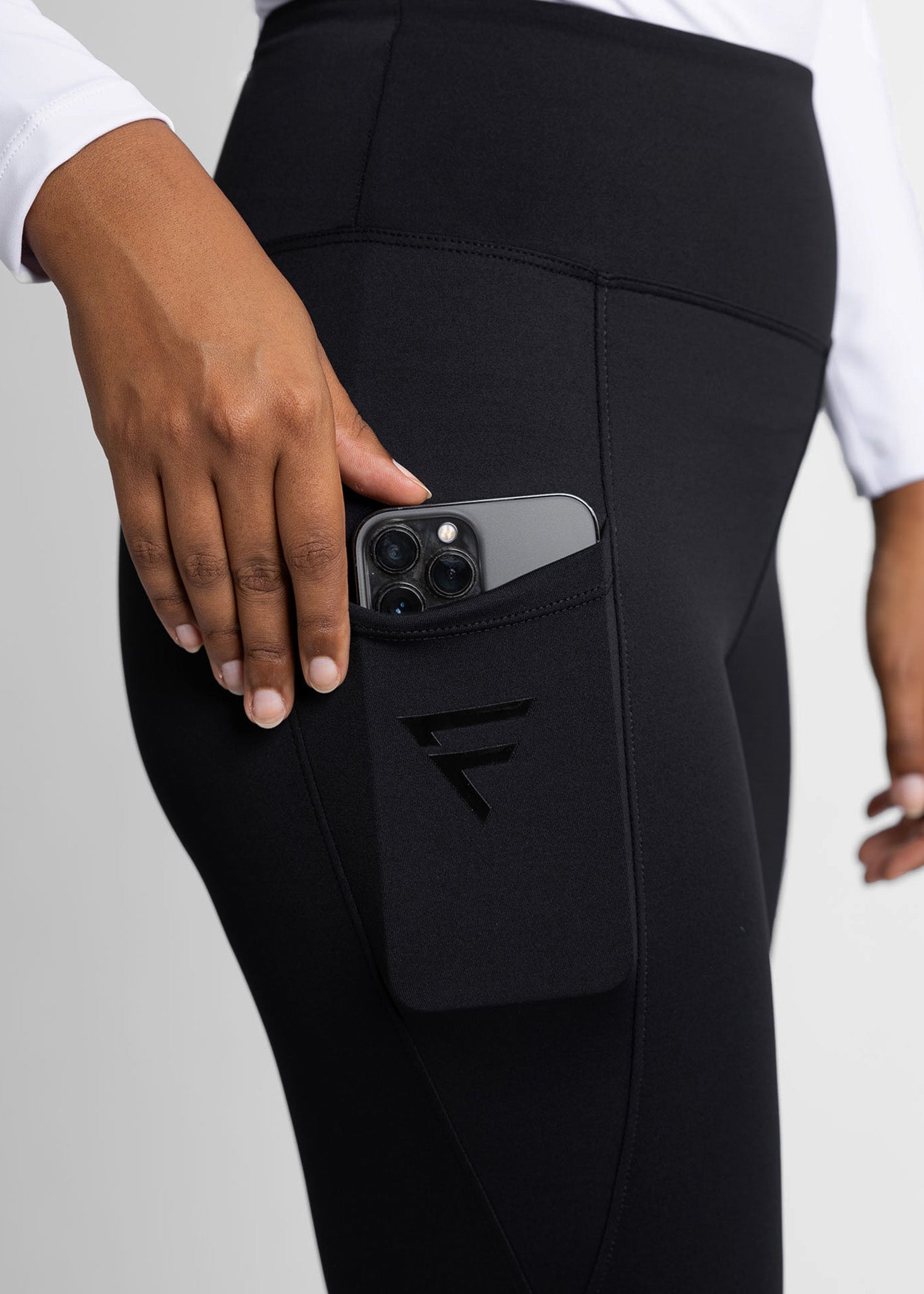 high-waisted, flare women golf leggings (black) featuring side pocket that is perfect for phones