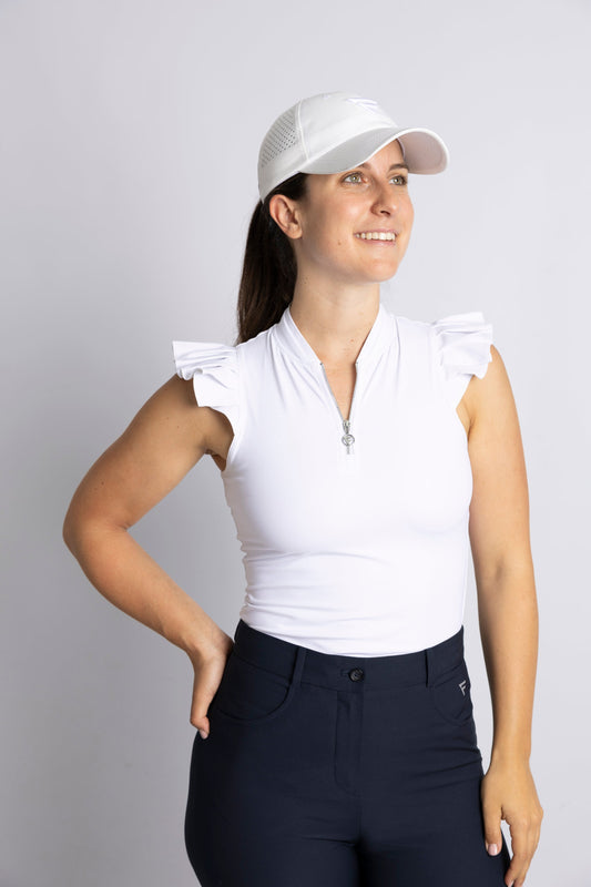 unisex golf cap with ventilation panels (white) featured with sleeveless shirt with ruffle details and high-waisted golf pants (navy)
