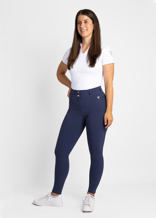 women high-waisted stretchy golf pants (navy) featured with modern collarless golf shirt (white)